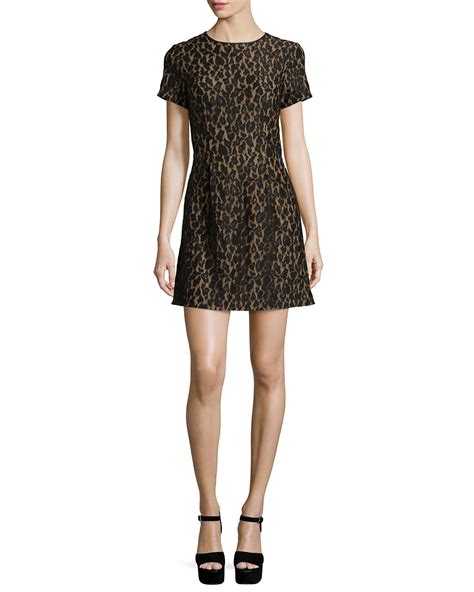 michael kors short sleeves dress black white pattern|Michael Kors shift dress.